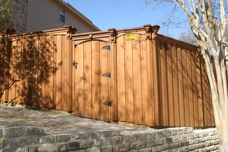 Cedar privacy fence and gate with decorative posts